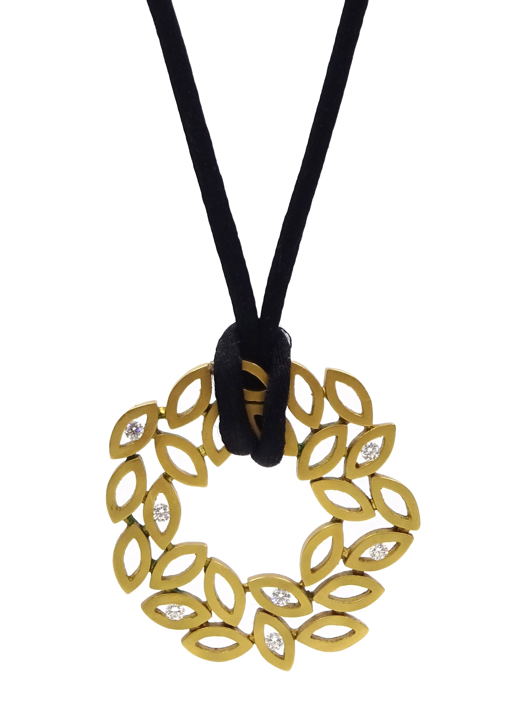 Greek 18ct gold pendant, stylised laurel leaf design set with seven round brilliant cut diamonds, o
