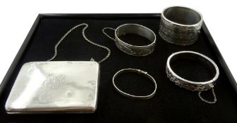Silver bangle by Henry Griffith & Sons Ltd, Birmingham 1957, three other silver bangles stamped or h