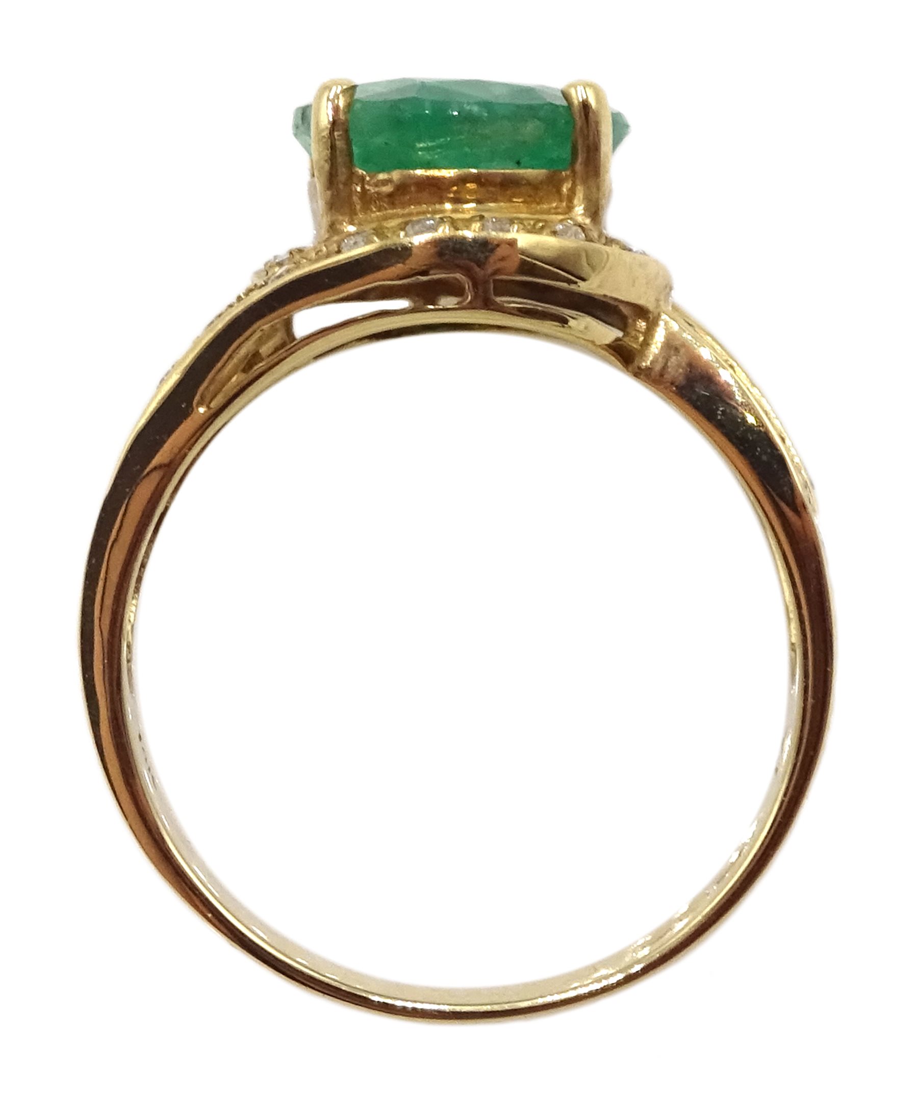 Gold oval emerald ring with diamond swirl surround and shank, stamped 14K - Image 5 of 8