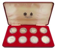 Eight Queen Elizabeth II sterling silver crown coins commemorating the Queen's 1977 Silver Jubilee,