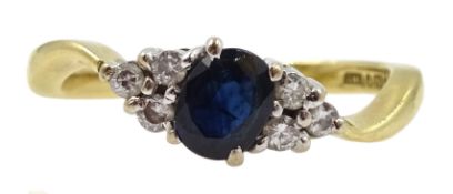 18ct gold oval sapphire and six stone diamond ring, hallmarked