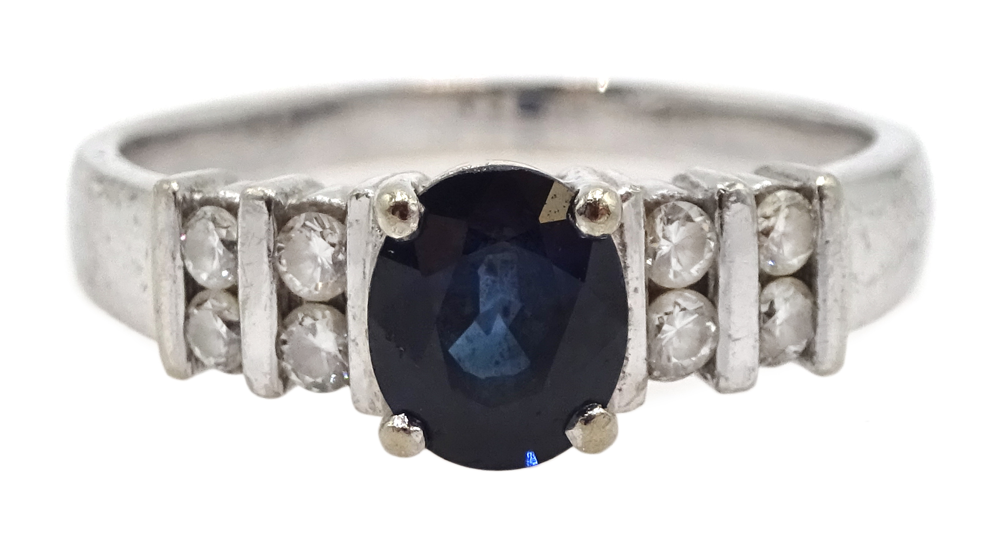 18ct white gold oval sapphire ring, with diamond set shoulders, stamped 750