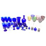 A set of six harlequin overlaid crystal hock glasses, in blue, green, yellow, burgundy, pink, and pu