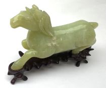 Chinese carve Jade model of a Horse on hardwood plinth, L14.5cm