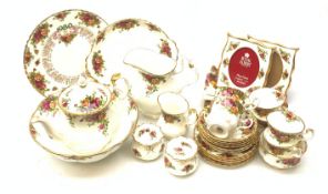 A Royal Old Country Roses teaset, comprising teapot, six teacups, six saucers, six side plates, milk