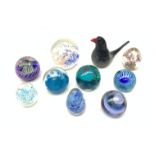 Ten glass paperweights, to include a boxed Caithness Pegasus paperweight, plus others Caithness exam