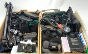 A collection of assorted cameras and accessories, to include examples by Praktica, Zenit,and Ilford