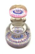 A 19th century glass paperweight inkwell and stopper, base of body and stopper decorated with concen
