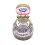 A 19th century glass paperweight inkwell and stopper, base of body and stopper decorated with concen