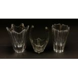 Two Orrefors clear Art Glass vases, largest H15cm, together with a Daum clear glass vases, H16cm.