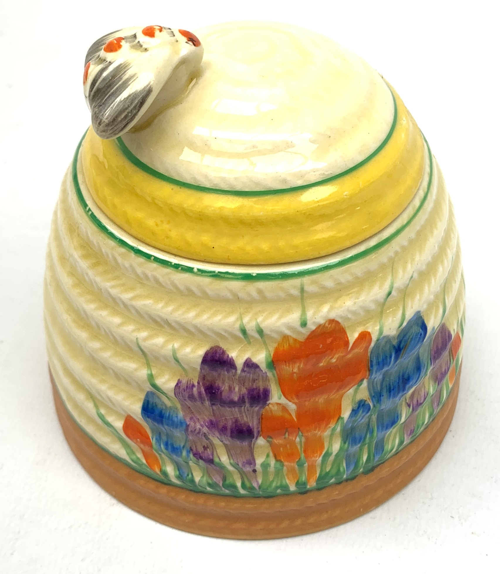 A Clarice Cliff Bizarre honey pot, of domed form with bee finial to the removable cover, decorated i - Image 8 of 13