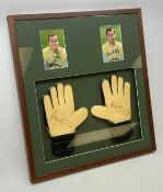 Pair of 1990s Leeds United goalkeeper's gloves signed by Nigel Martyn and Paul Robinson, mounted in