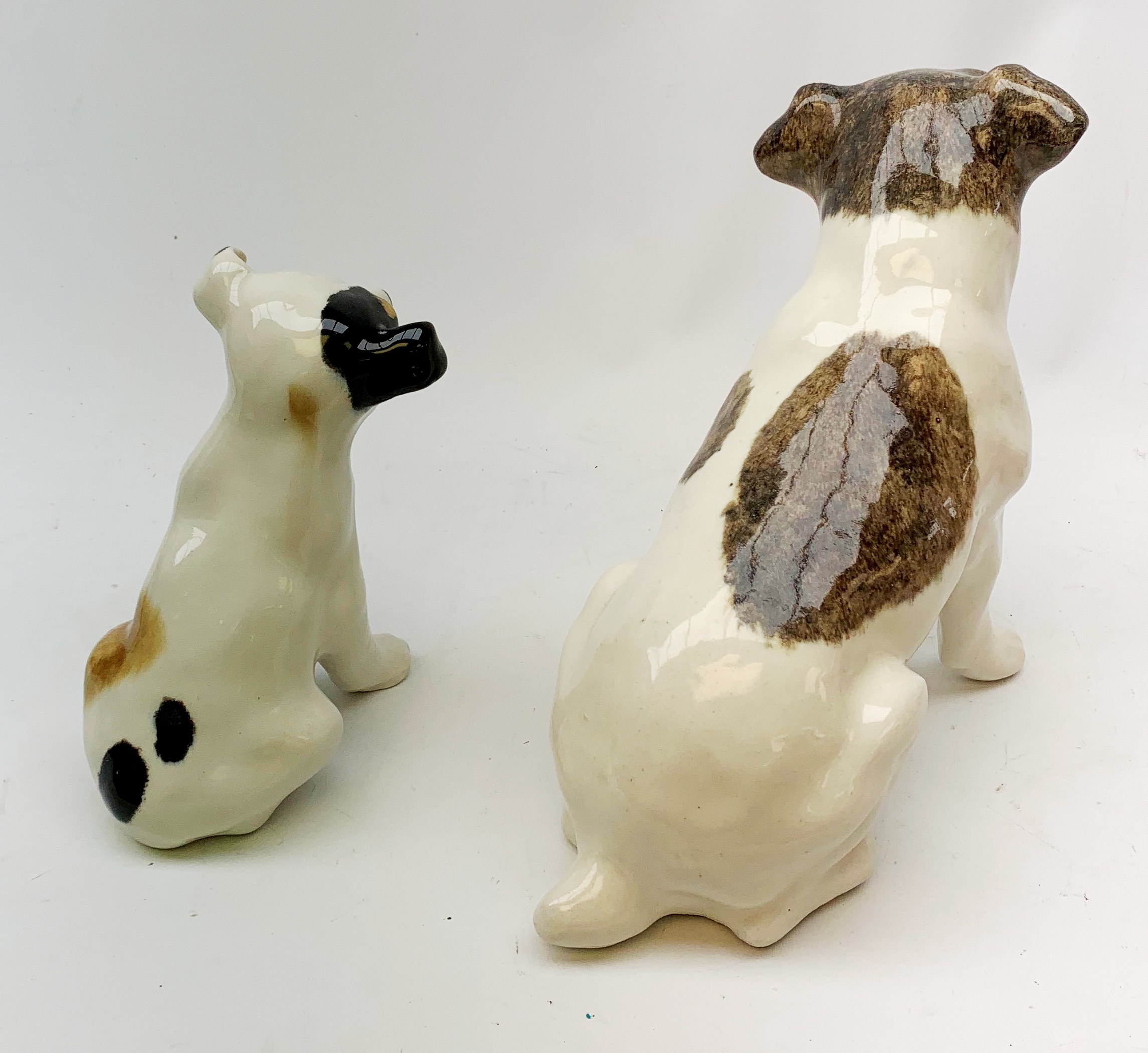 A Winstanley pottery figure modelled as a terrier dog, with inset glass eyes, marked beneath, H28cm, - Image 3 of 3