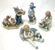 A Lladro figurine, 'This one's mine' Model 5376, H19cm, together with three further Lladro figurines