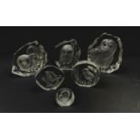 A group of six Mats Jonasson Swedish intaglio moulded glass paperweights, largest H15.5cm.