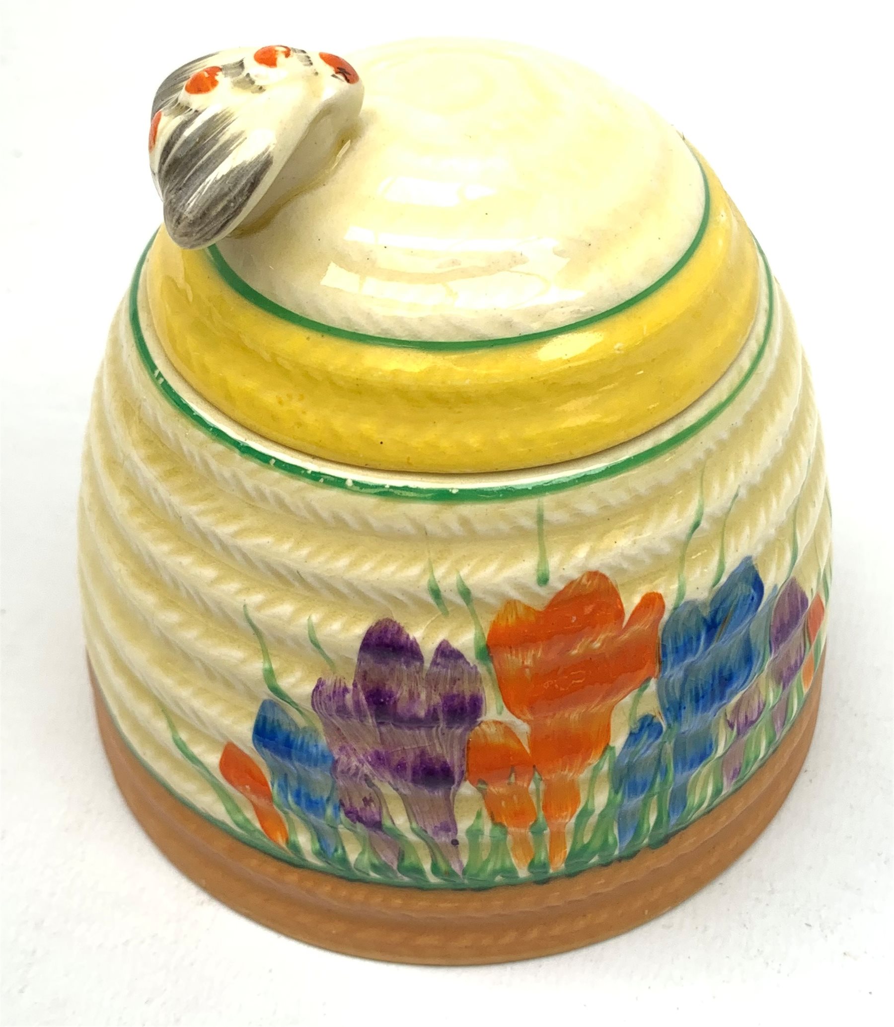 A Clarice Cliff Bizarre honey pot, of domed form with bee finial to the removable cover, decorated i - Image 2 of 13