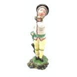 A 19th century H�chst porcelain figure, modelled as a young boy holding a Garland of flowers, H14cm,