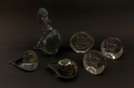 A group of three Mats Jonasson Swedish intaglio moulded glass paperweights, together with three Swee