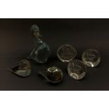 A group of three Mats Jonasson Swedish intaglio moulded glass paperweights, together with three Swee