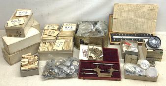 A collection of various watch parts and accessories, to include a large quantity of watch B.C.L. gla