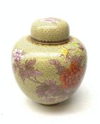 A 20th century cloisonne ginger jar and cover, of ovoid form, the yellow ground decorated with a but
