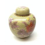 A 20th century cloisonne ginger jar and cover, of ovoid form, the yellow ground decorated with a but