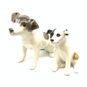 A Winstanley pottery figure modelled as a terrier dog, with inset glass eyes, marked beneath, H28cm,