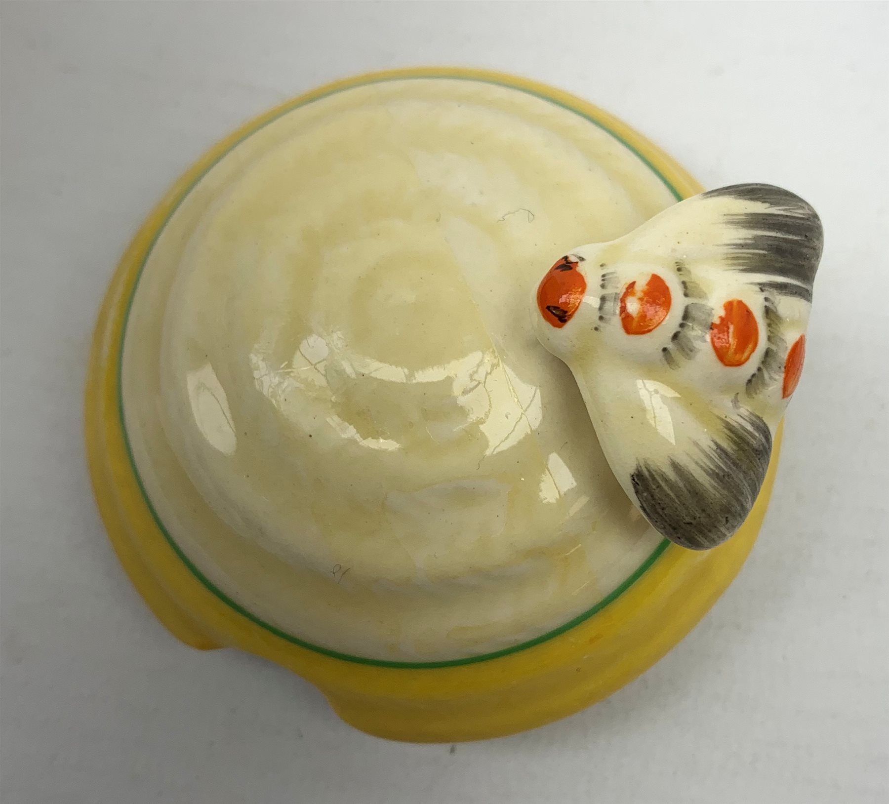 A Clarice Cliff Bizarre honey pot, of domed form with bee finial to the removable cover, decorated i - Image 6 of 13