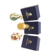 Three boxed Royal Worcester candle snuffers from The Connoisseur Collection, each modelled as a frui