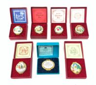A collection of seven boxed Bilston and Battersea, and Halcyon Days enamel boxes, comprising Halcyon