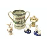 A large 19th century Staffordshire loving cup, detailed 'The Real Cabinet of Friendship Justice and