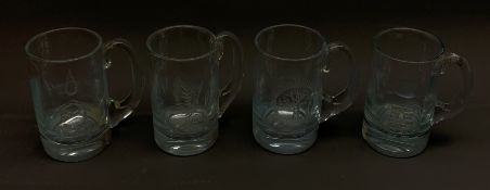 Four Stromberg Scandinavian Art Glass tankards, each signed and numbered, each approximately H14cm.