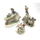 A Lladro figurine, 'Barrow of Fun' Model 5460, H20.5cm, together two further Lladro figurines, 'Litt