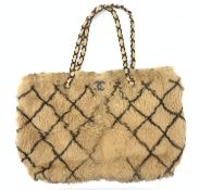 A Chanel 2001 rabbit fur tote bag, with diamond design and beige leather interior, serial no. 688076