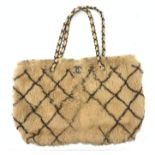 A Chanel 2001 rabbit fur tote bag, with diamond design and beige leather interior, serial no. 688076
