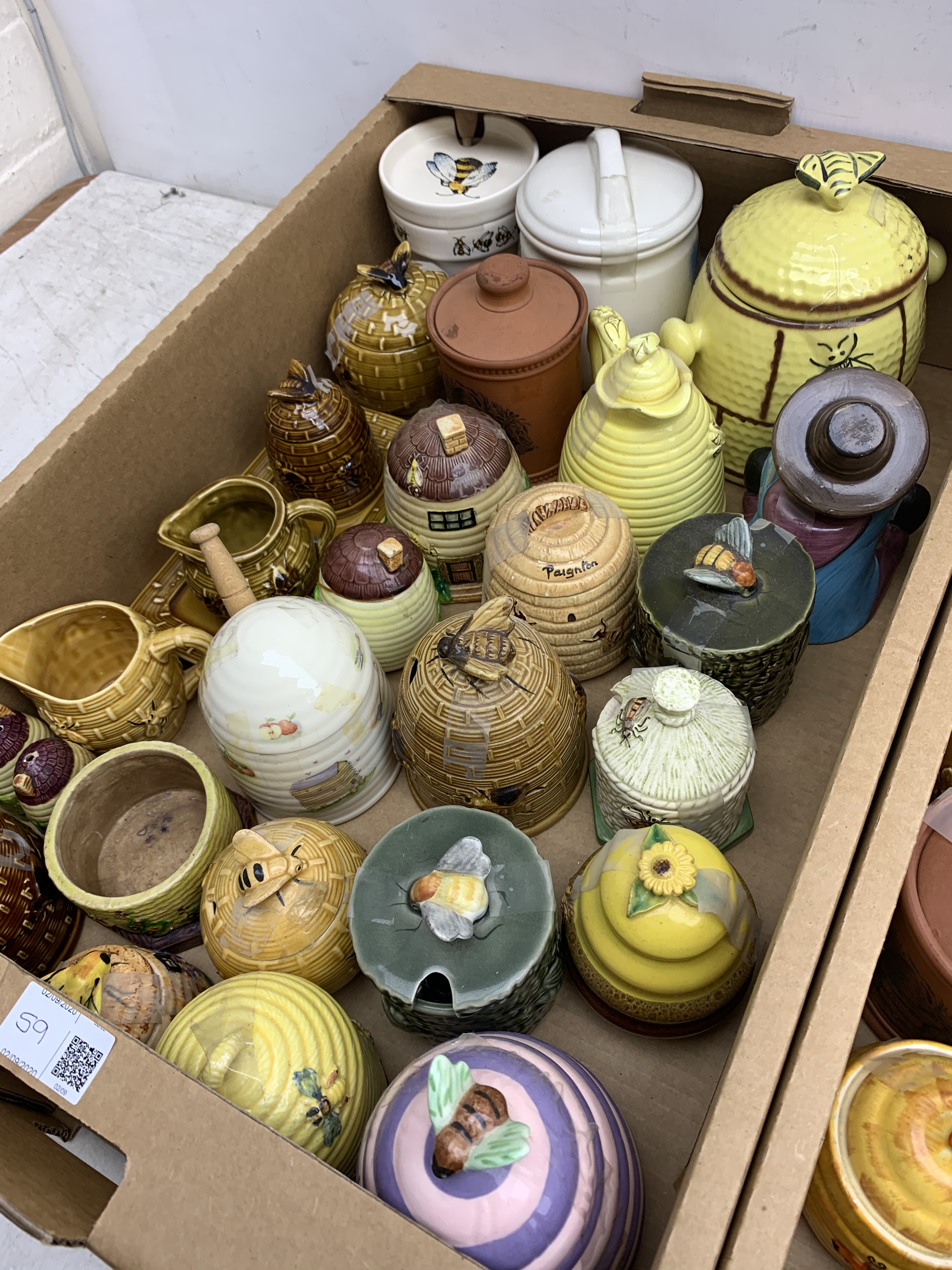 A large collection of various ceramic honey pots, to include examples in the form of bee skeps, etc. - Image 2 of 4