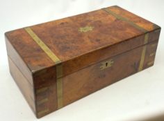 A Victorian walnut and brass banded writing slope, the hinged cover with vacant brass cartouche, ope