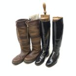 A pair of riding boots, together with a pair of Dubarry boots (size 9).