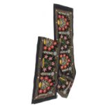 Large velvet crewel work wall hanging worked with bright colours with flowering planters within a st