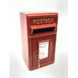 A reproduction red painted postbox, with keys, H43cm.