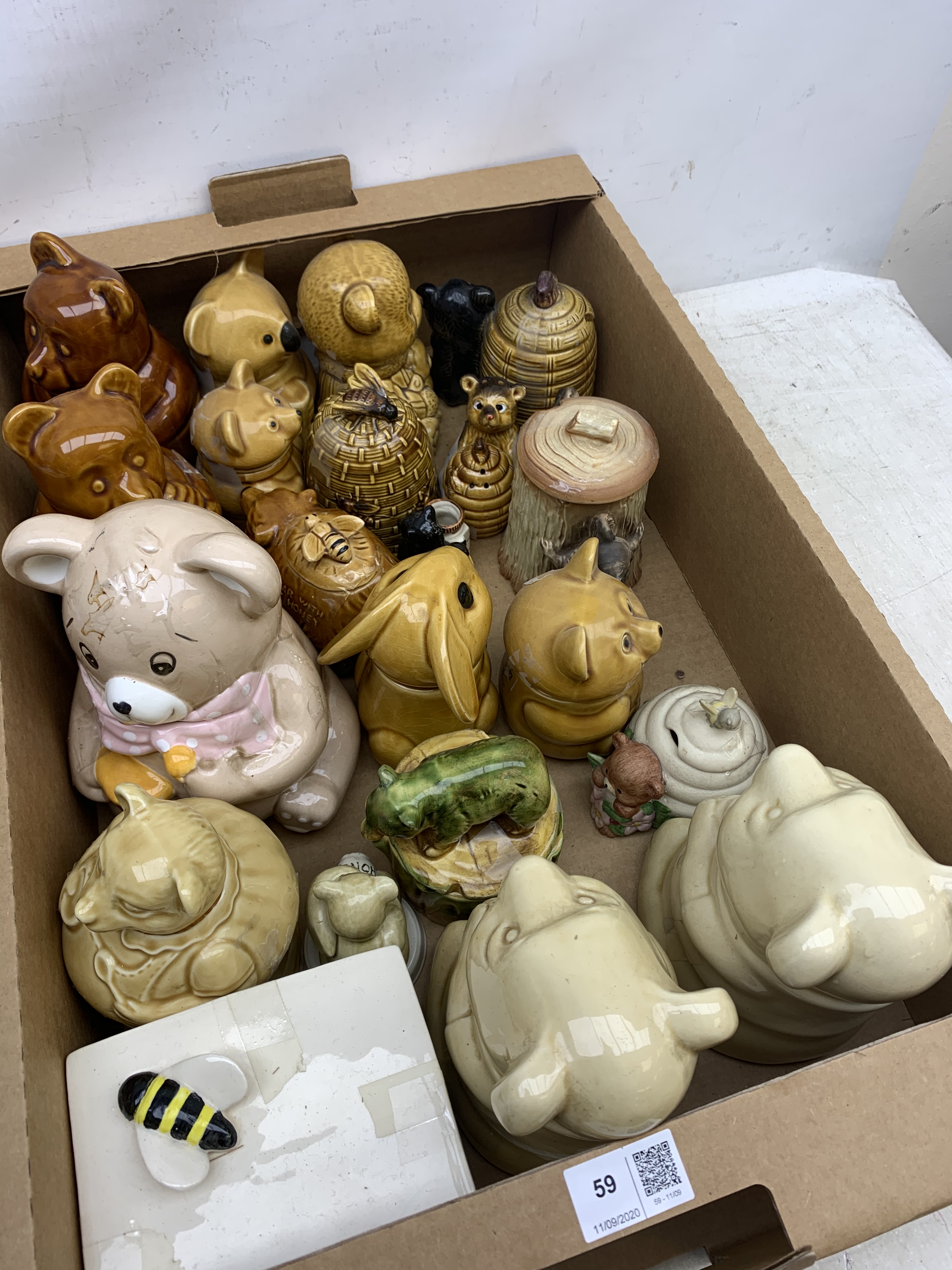 A large collection of various ceramic honey pots, to include examples in the form of bee skeps, etc. - Image 4 of 4