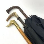 A silver mounted umbrella with stag horn handle, hallmarks worn and rubbed, probably London, maker's