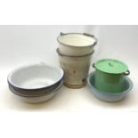 A collection of various enamel basins and buckets.