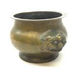 A Chinese bronzed censer, of squat bellied form, with twin qilin mask handles, D24cm.