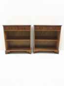 Pair inlaid yew wood open bookcases, two drawers above single shelf, shaped bracket supports, W76cm