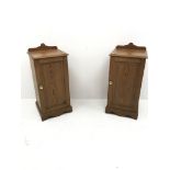 Pair 20th century pitch pine bedside cabinets, raised shaped back, moulded top, single door, plinth