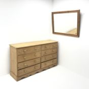 Pine chest, eight drawers, shaped plinth base (W152cm, H88cm, D41cm) and a pine framed mirror (W104c