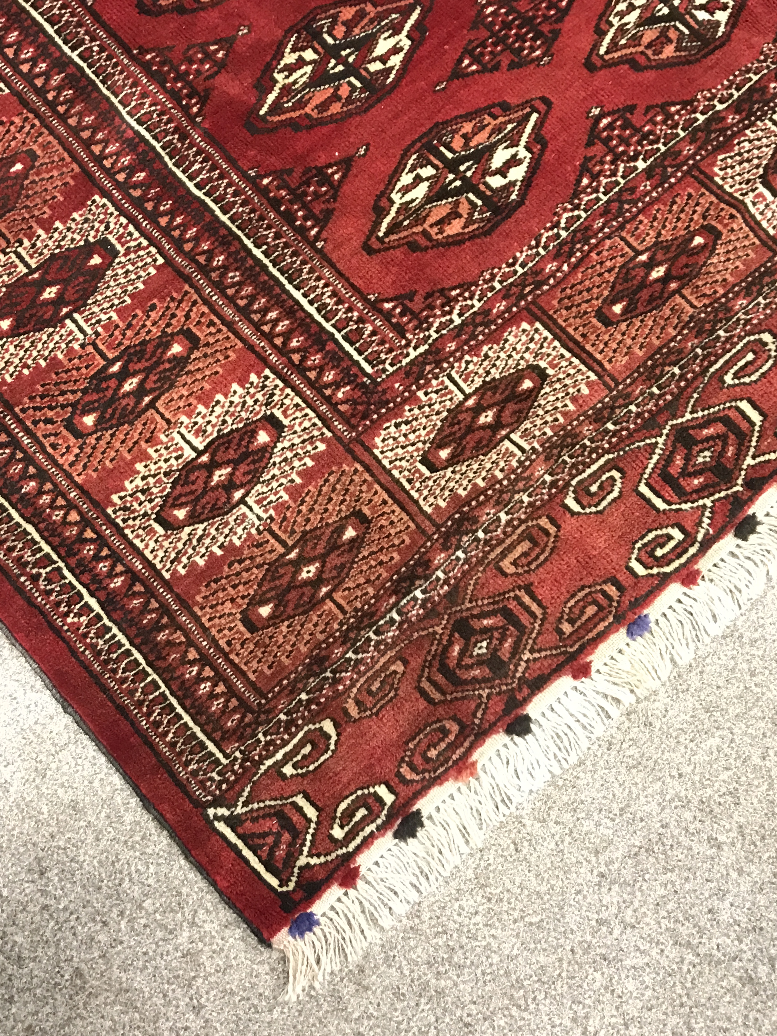 Turkman Tekke Bokhara red ground rug, the field and border decorated with guls, 177cm x 213cm - Image 6 of 8