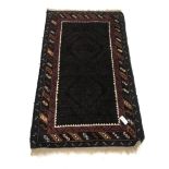 Kashmir blue ground rug, repeating border, 145cm x 89cm