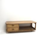 Ercol light elm 'Minerva' long rectangular coffee table fitted with two drawers on castors, 125cm x